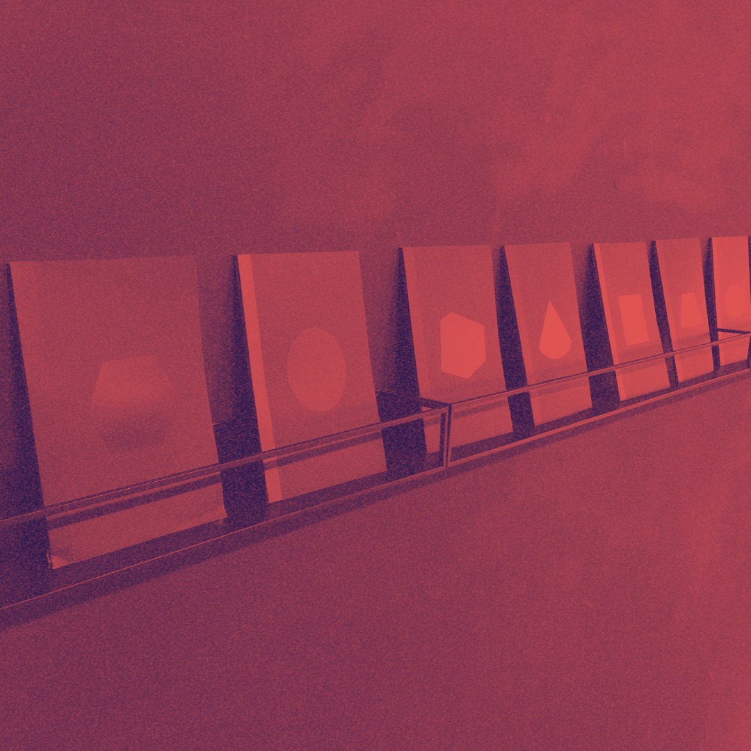 image of books on a shelf with a red filter